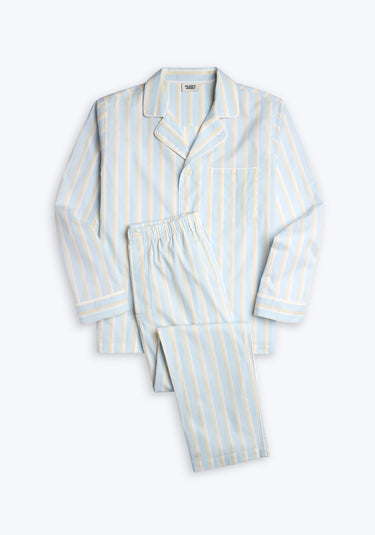 Light blue pajama set with cream and tan stripes and white piping on a white background.