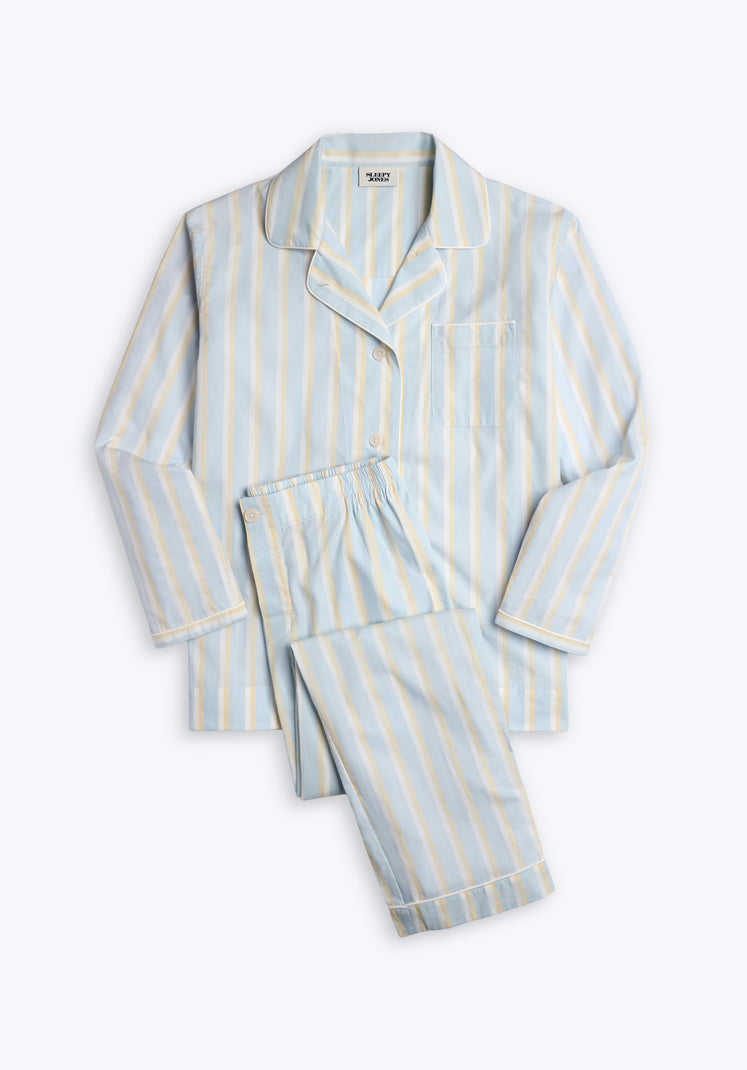 Light blue, white, and tan striped pajama set on a white background