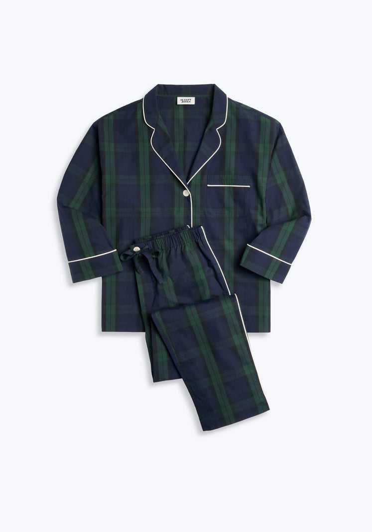 Longsleeve Navy and green blackwatch plaid pajama set with white piping on a light gray background